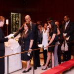 Chaplain Holly A.Gaudette delivering the urn and ashes to Mrs. Marieanne Cholmondeley and family